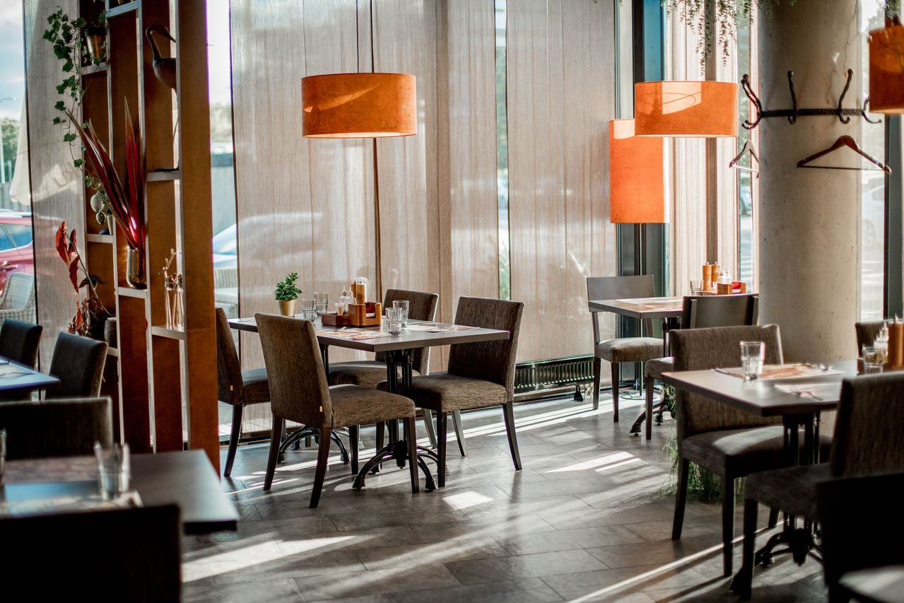 Dining room under warm afternoon pendant lights
