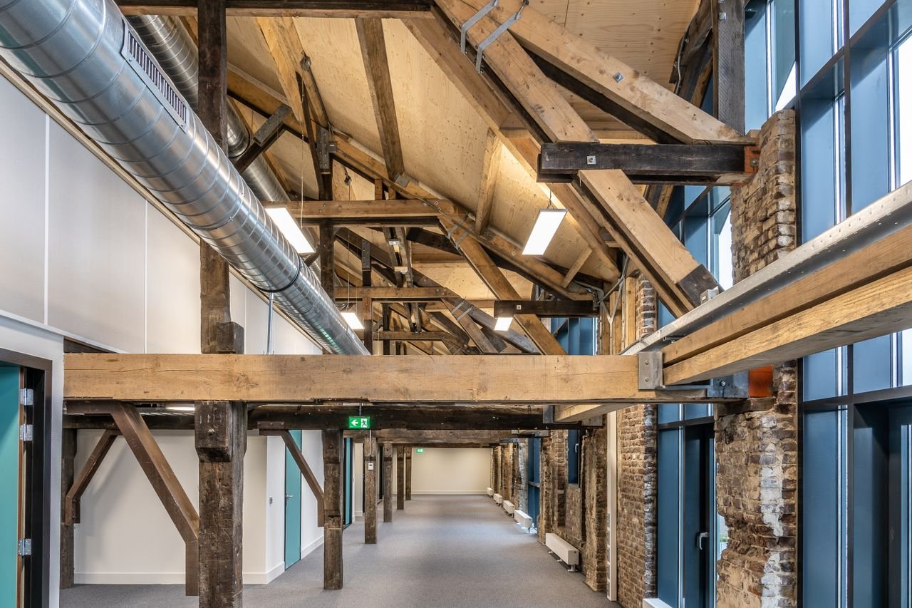 Exposed timber structure and metal services