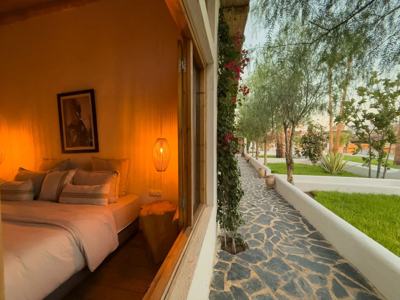 Master suite opening directly onto a private garden path