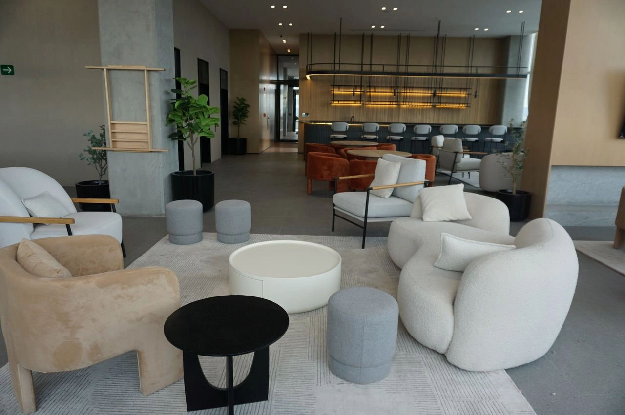 Open lounge furnished with sculptural seating