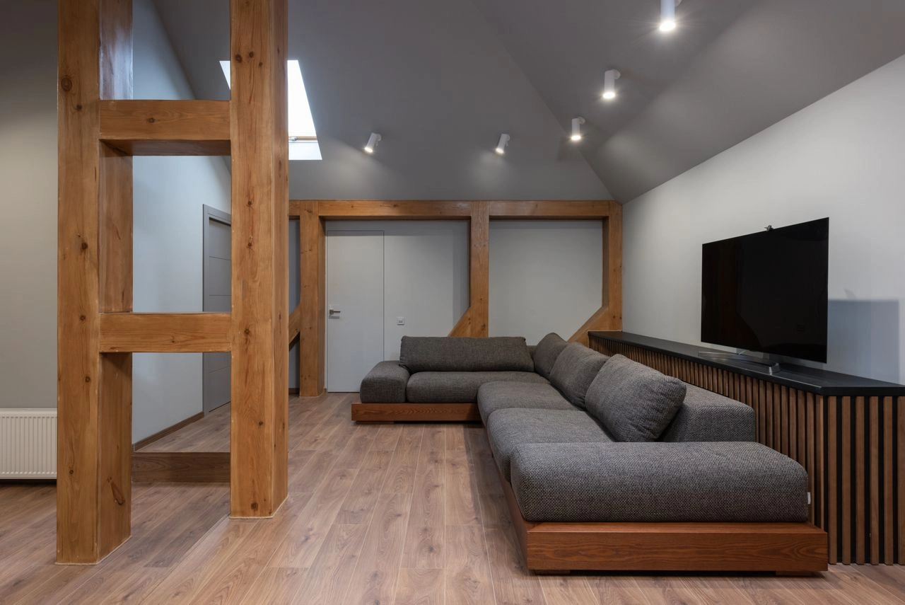 Timber-framed living room prepared for the evening