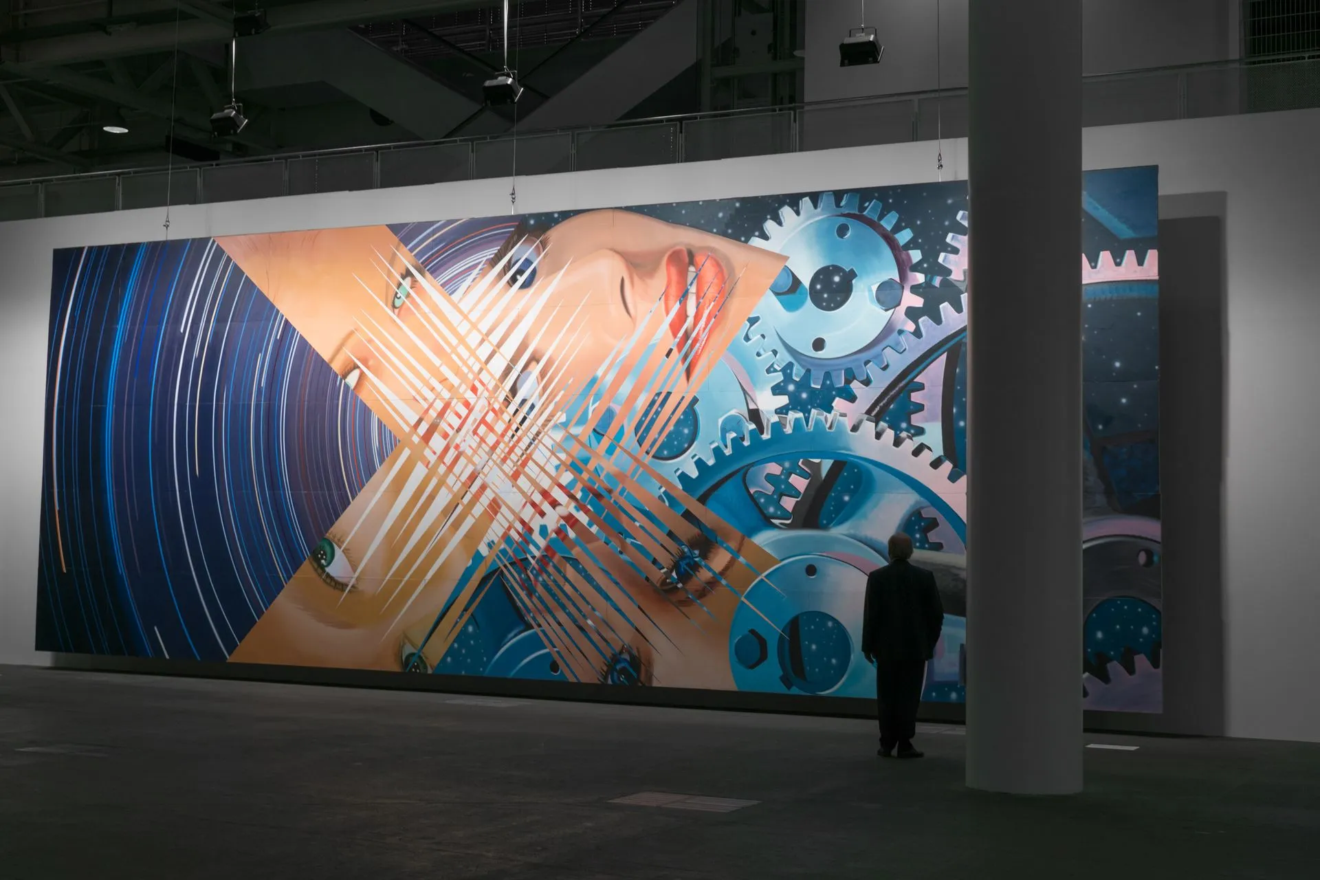 Large graphic artwork viewed across an open gallery space