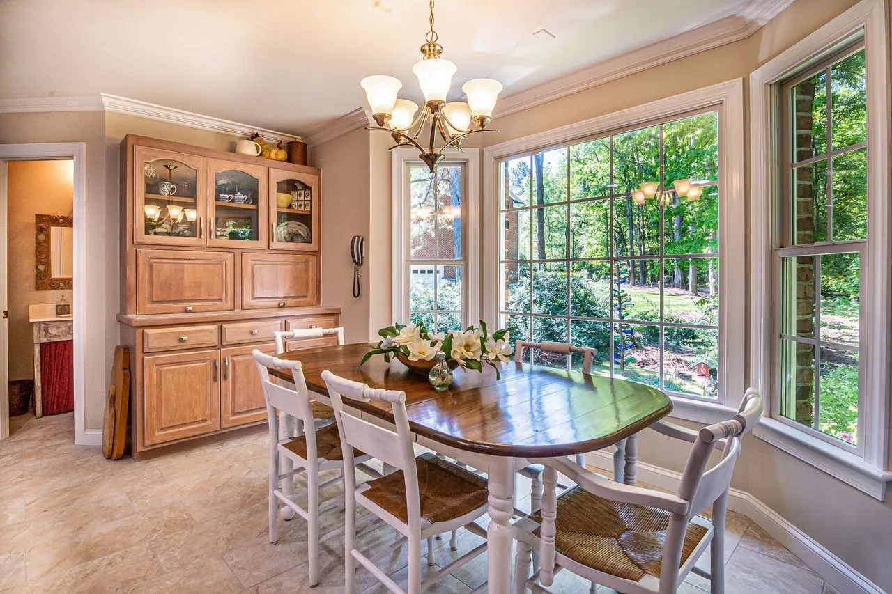 Family dining room opening toward a planted garden
