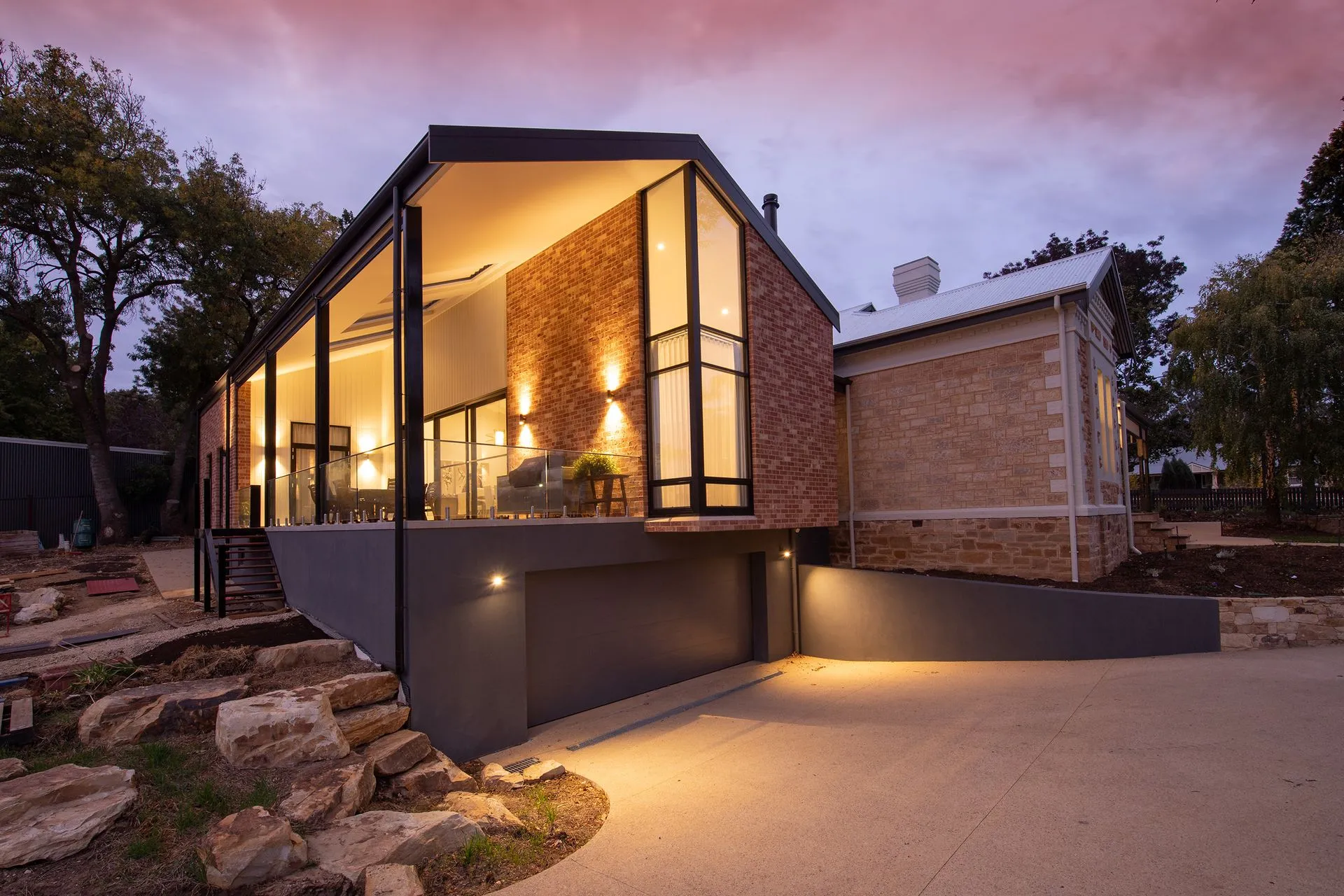 Garden House extension glowing at dusk