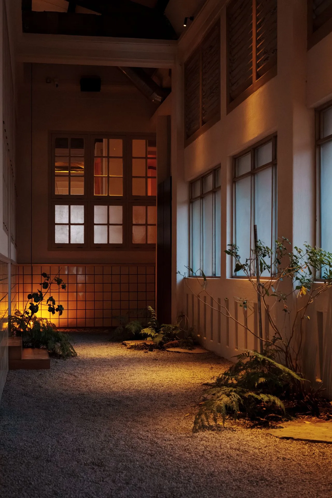 Sheltered entrance illuminated at dusk